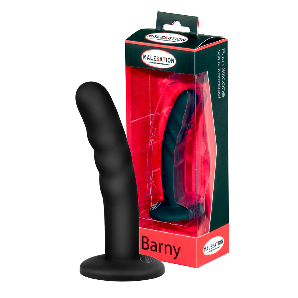 Ein schwarzer, wellenförmiger Dildo mit flacher Basis steht vor seiner rot-schwarzen Verpackung.
