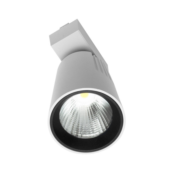 Un foco LED blanco para riel con anillo interior negro sobre fondo blanco.