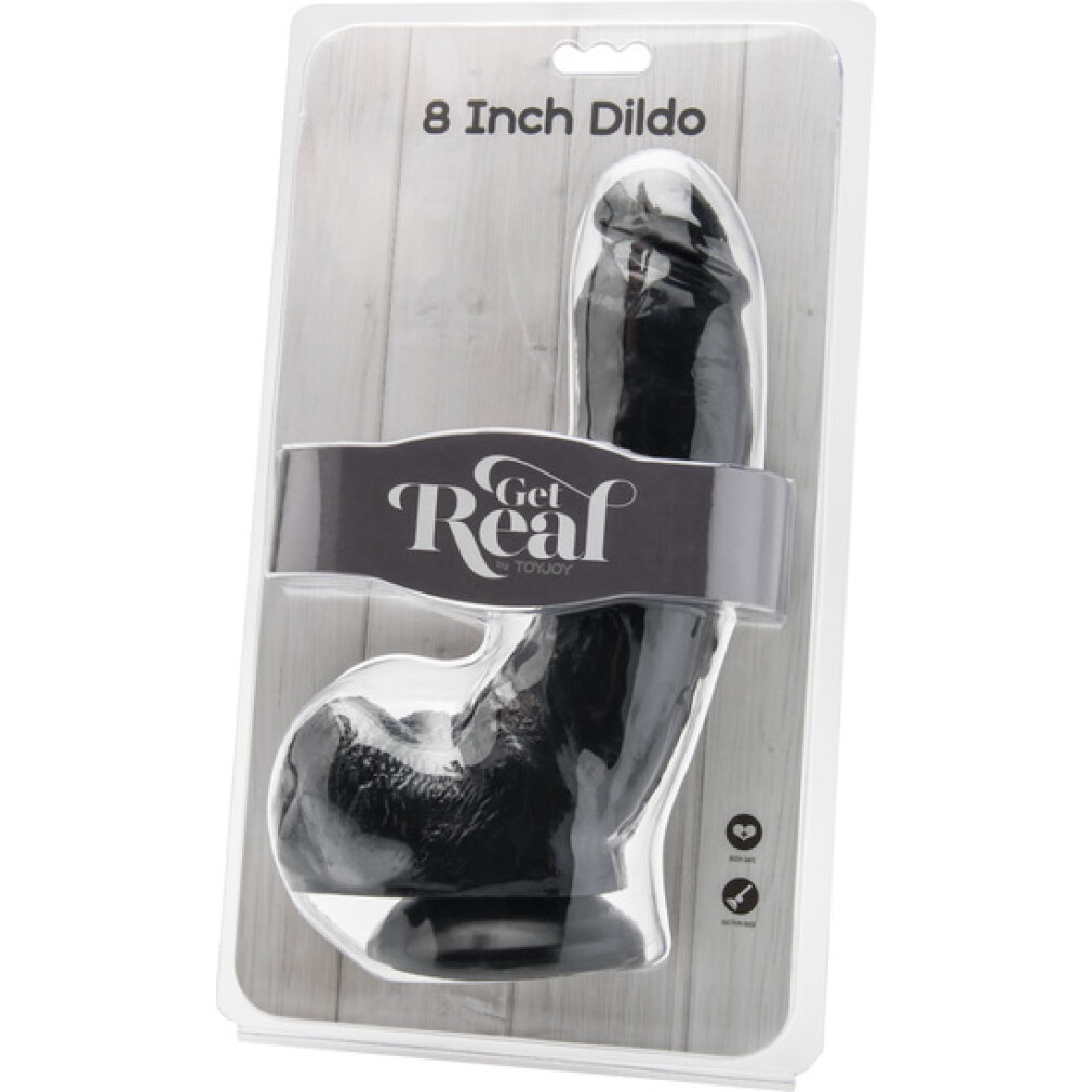Ein schwarzer 8-Zoll-Dildo in Plastikverpackung mit Etikett vor weißem Holzhintergrund.