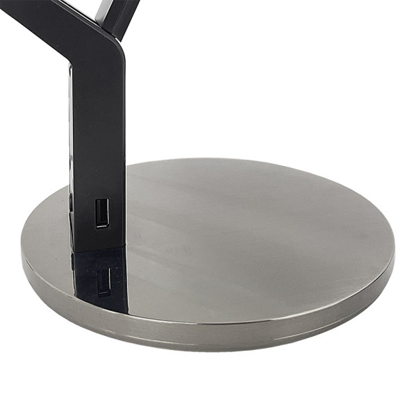 Una base redonda y brillante con un brazo metálico negro y un puerto USB.
