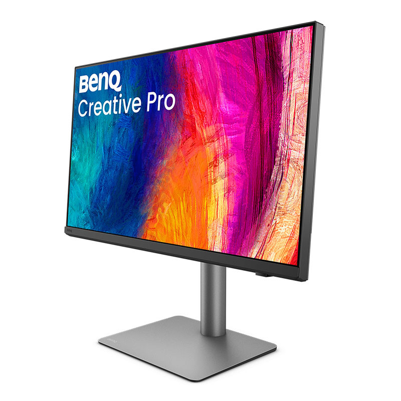Un monitor BenQ Creative Pro con uno sfondo astratto colorato sullo schermo, su supporto grigio.