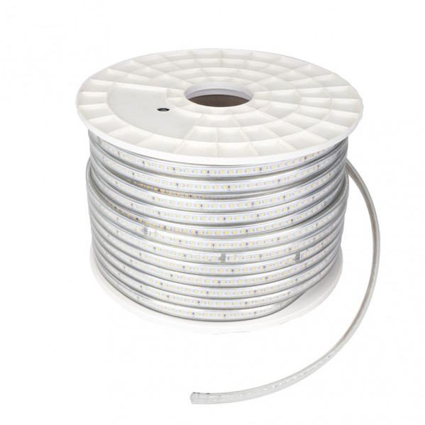 Una bobina blanca con luces LED enrolladas sobre un fondo blanco.
