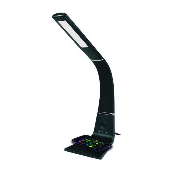 Una lámpara de mesa LED negra con base de carga inalámbrica para teléfonos.