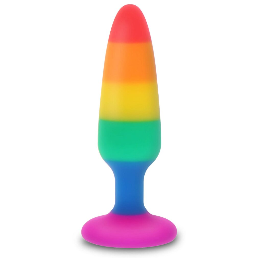 Ein glattes, regenbogenfarbenes Plug-Spielzeug mit ausgestelltem Sockel steht auf weißem Grund.