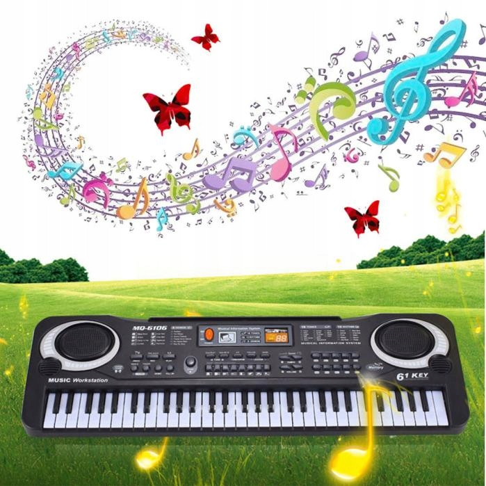 Czarny keyboard w zielonym krajobrazie z unoszącymi się nutami i czerwonymi motylami.