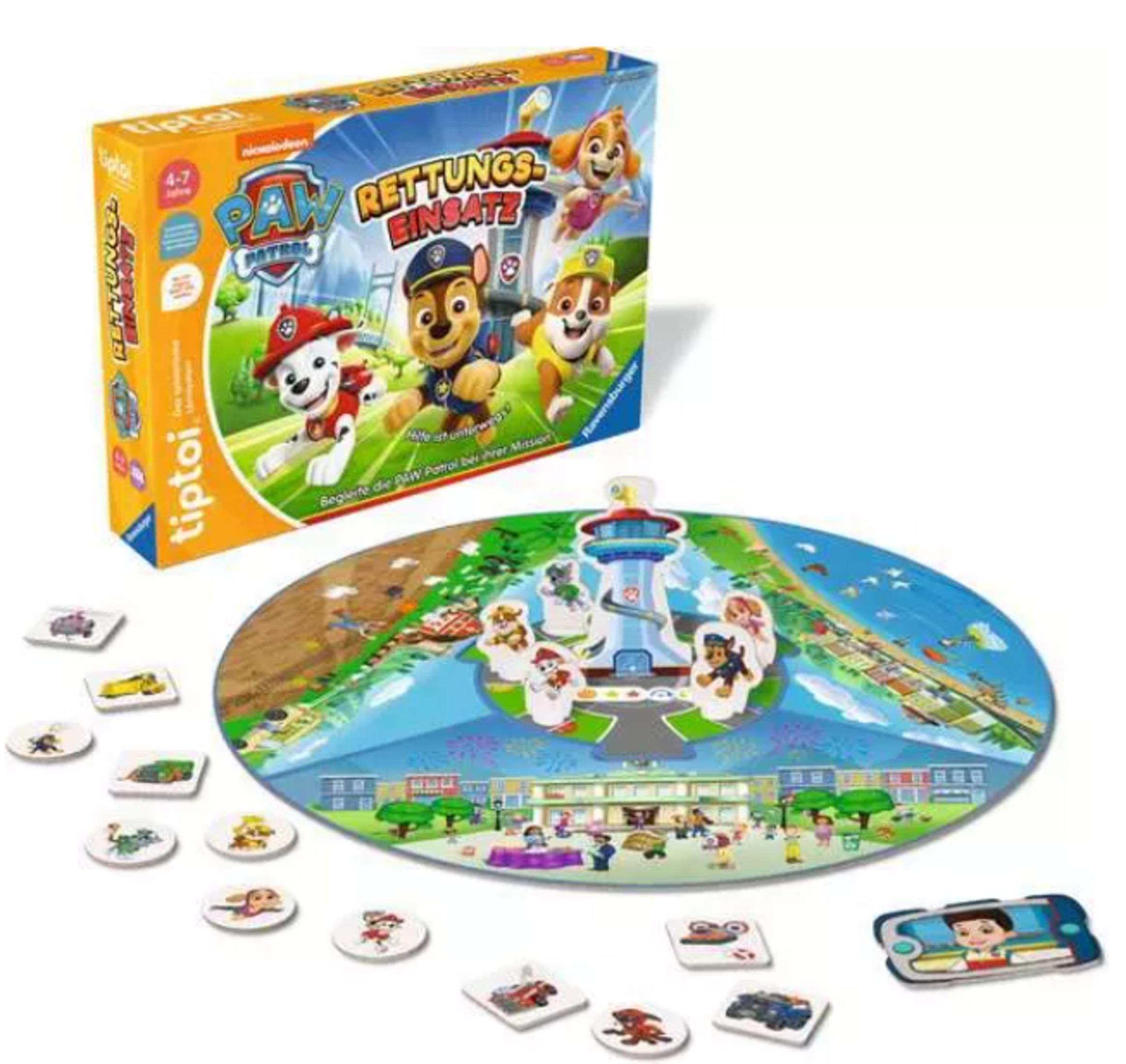 PAW-Patrol-Brettspiel mit gelber Schachtel, rundem Spielfeld, Figuren, kleinen Plättchen und einem Tiptoi-Stift.