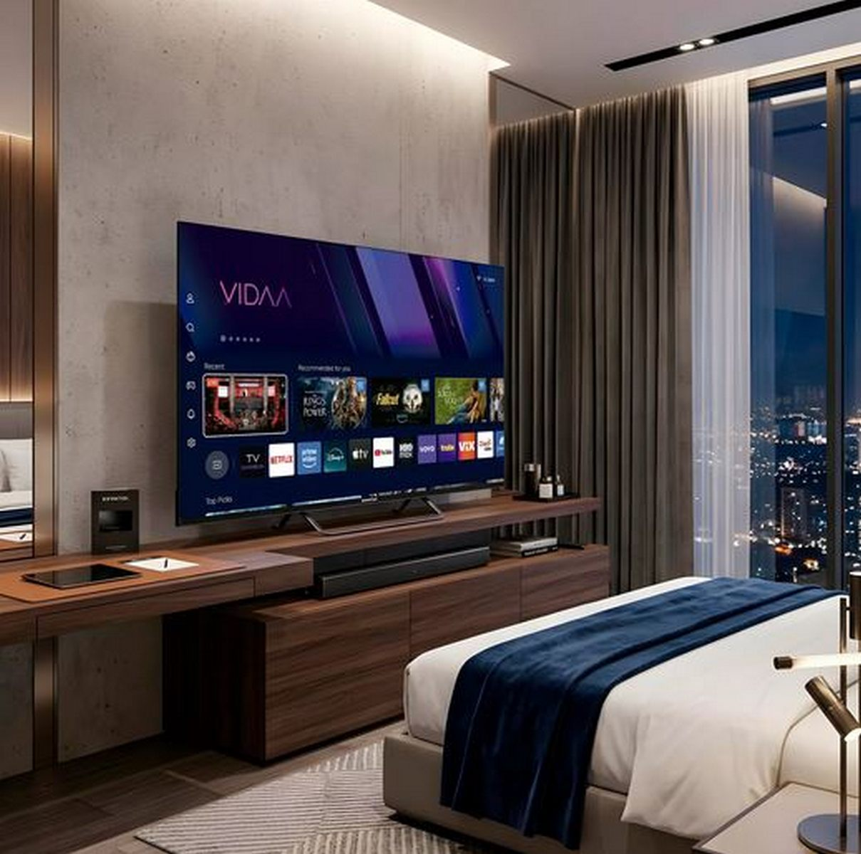 Dormitorio moderno con gran televisor en consola de madera y vista nocturna de la ciudad.