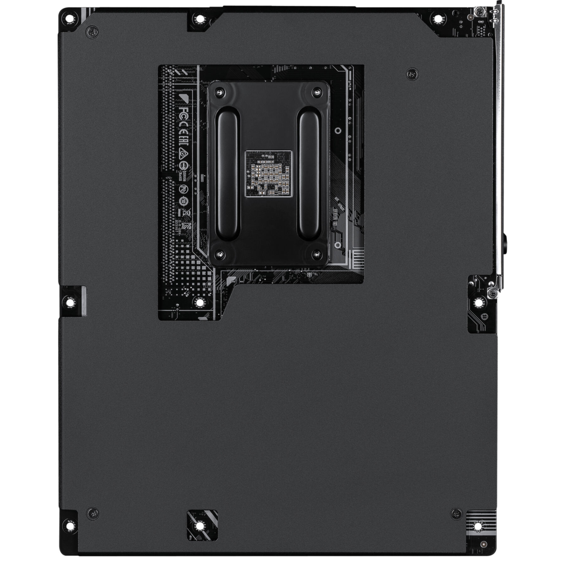 La parte trasera de una placa base de computadora negra, con una placa trasera de metal central y varios tornillos.