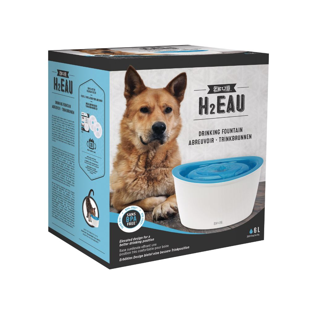 Envase del producto de la fuente para beber Zeus H2EAU con la gráfica de un perro marrón y una fuente azul.