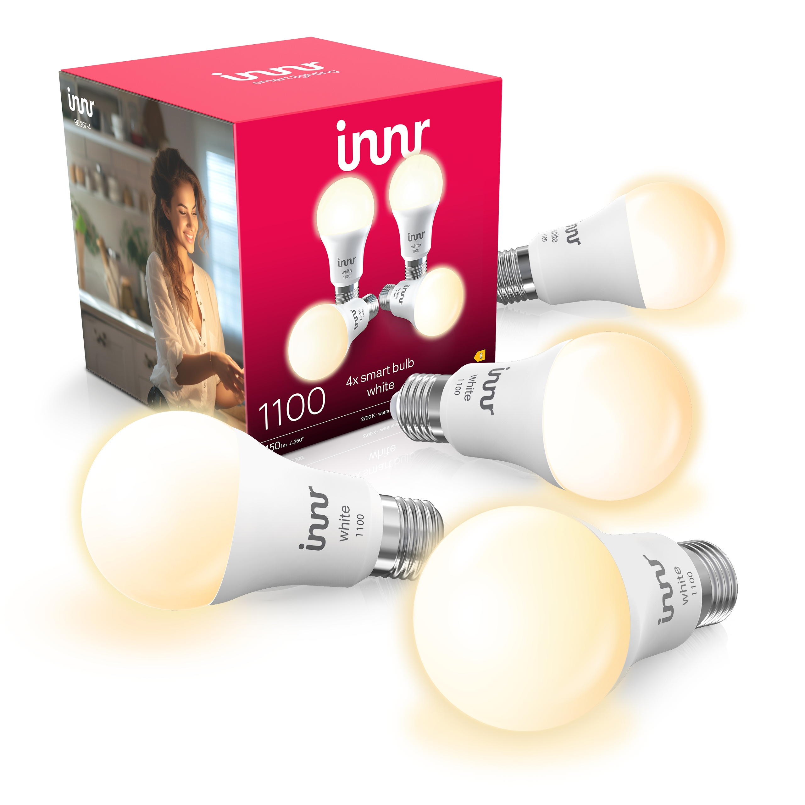 Quatre ampoules connectées blanches Innr et leur boîte rose.