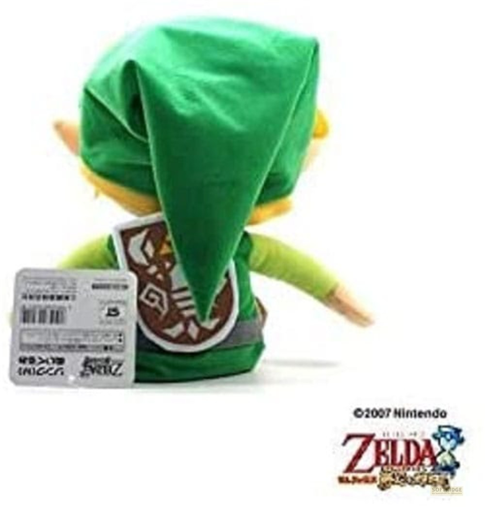 Rückseite einer Link-Plüschfigur mit grüner Mütze und Schild auf weißem Grund.