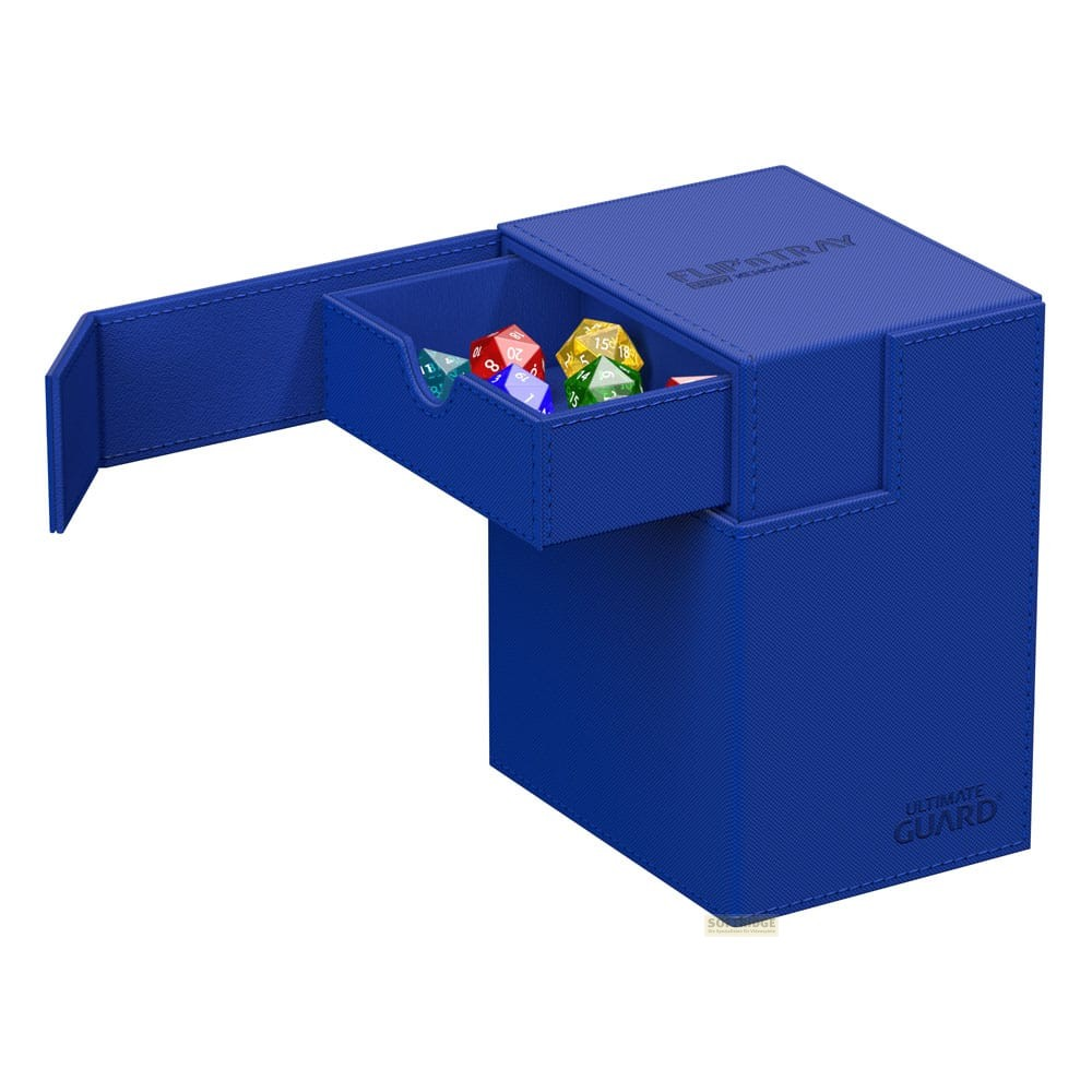 Boîte bleue Ultimate Guard Flip'n'Tray avec un tiroir ouvert contenant des dés colorés.