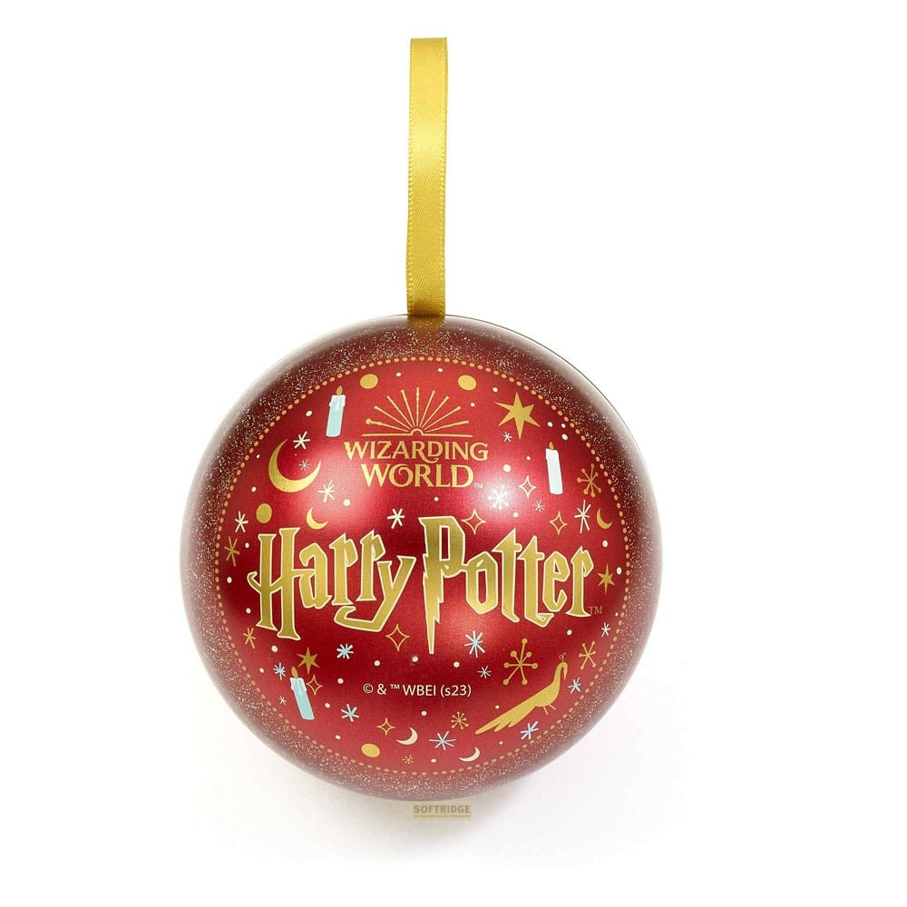 Adorno navideño rojo de Harry Potter con logo dorado, estrellas y lunas.