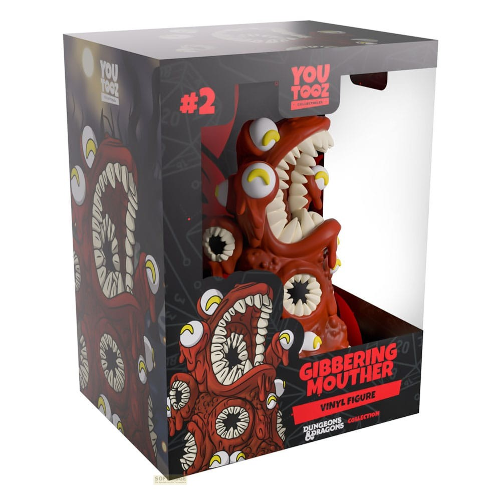 Una figura de vinilo Gibbering Mouther roja en una caja Youtooz con arte de monstruos y logotipos de D&D.