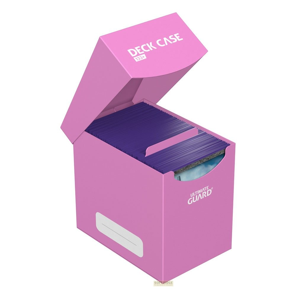 Une boîte de jeu rose Ultimate Guard ouverte et remplie de cartes violettes.