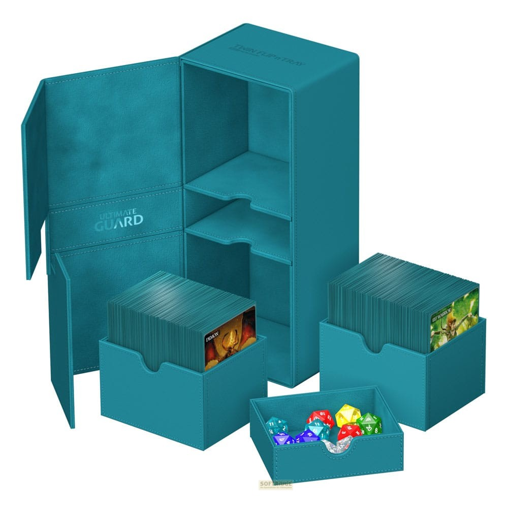 Une boîte à cartes turquoise avec deux boîtes de deck pleines de cartes et un plateau séparé avec des dés colorés.