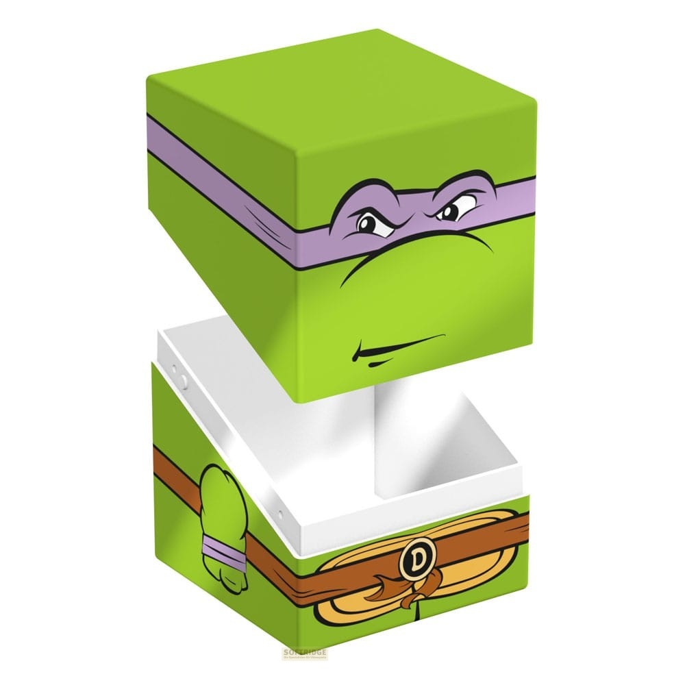 Boite de rangement verte avec un design de Donatello des Tortues Ninja et un couvercle ouvert.