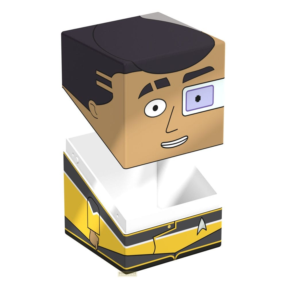 Une figurine Star Trek cubique avec un uniforme jaune et une visière sur un œil.
