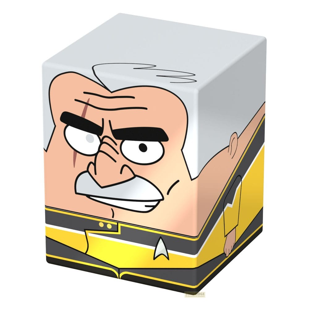Boîte cubique avec le portrait de dessin animé d'un personnage âgé sévère en uniforme jaune et noir Star Trek.