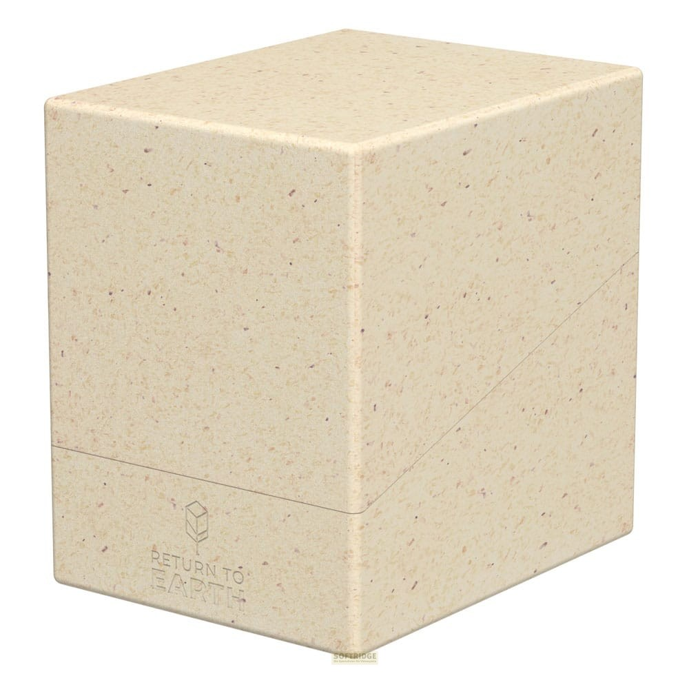 Une boîte de deck rectangulaire beige mouchetée avec le texte "RETURN TO EARTH" sur le devant sur fond blanc.