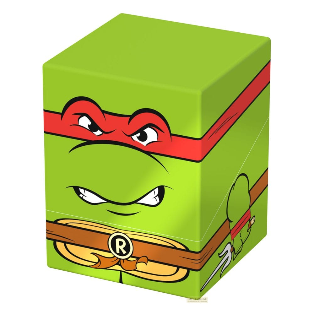 Boîte de rangement verte représentant le visage de Raphael des Tortues Ninja avec un bandeau rouge.