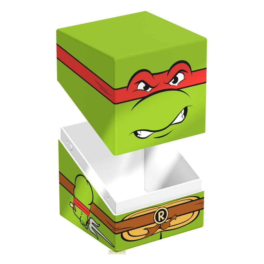 Boîte à cartes verte avec le visage de Raphael des Tortues Ninja et un masque rouge.