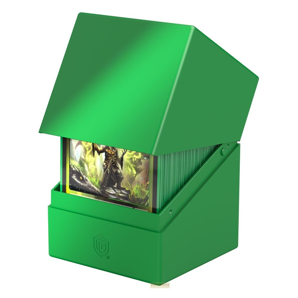 Une boîte de deck vert vif avec un couvercle ouvert, remplie de cartes à collectionner.