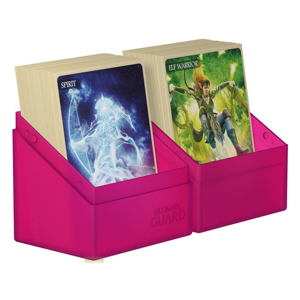 Deux boîtes de cartes roses contiennent des piles de cartes à collectionner avec un esprit bleu et un elfe guerrier.