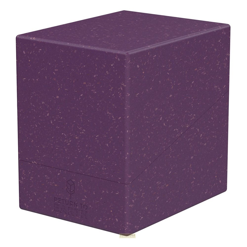 Une boîte de deck violette mouchetée avec les mots Return to Earth et un logo de feuille sur le devant sur fond blanc.