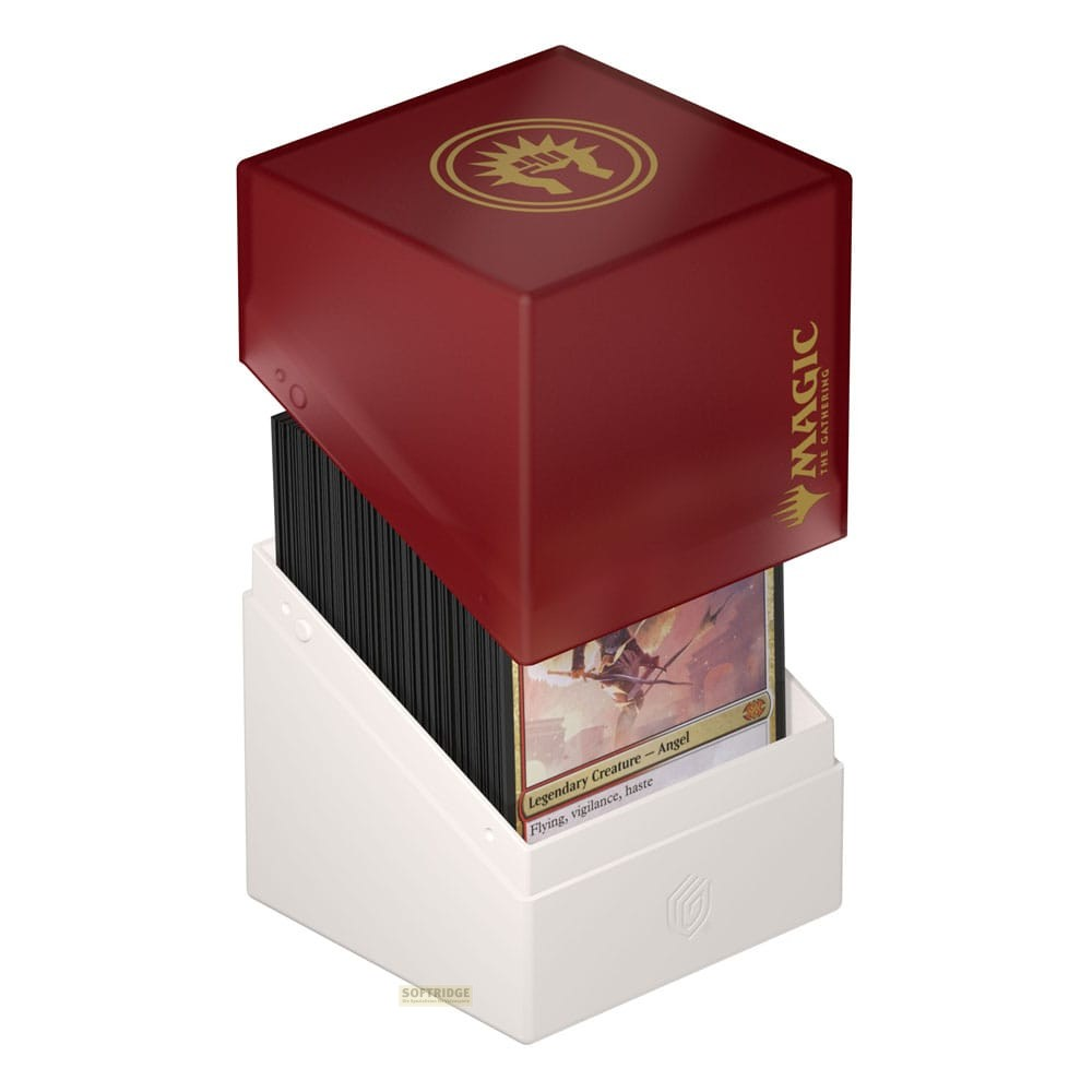 Une boîte de cartes rouge et blanche Magic: The Gathering remplie, la carte avant montre un ange légendaire.