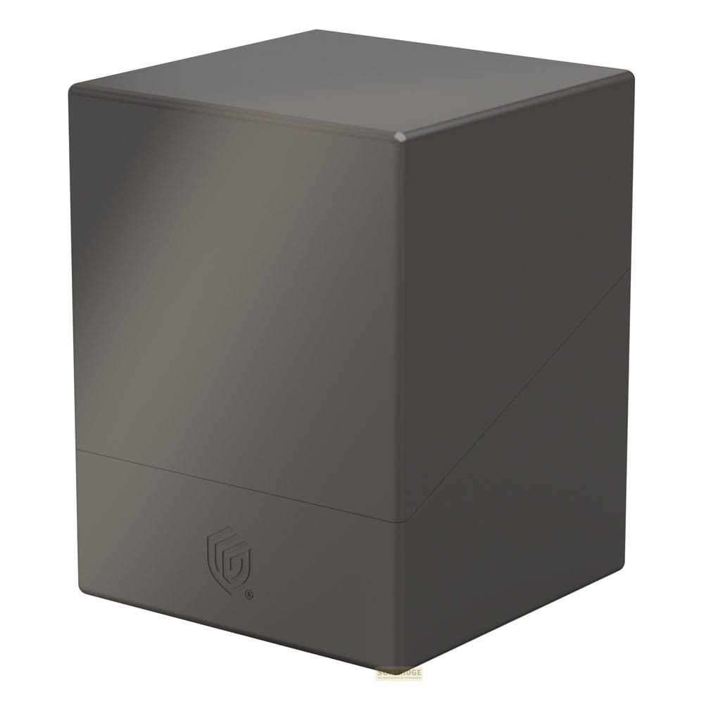 Une boîte de rangement cube gris foncé avec un petit logo de bouclier sur le panneau avant.
