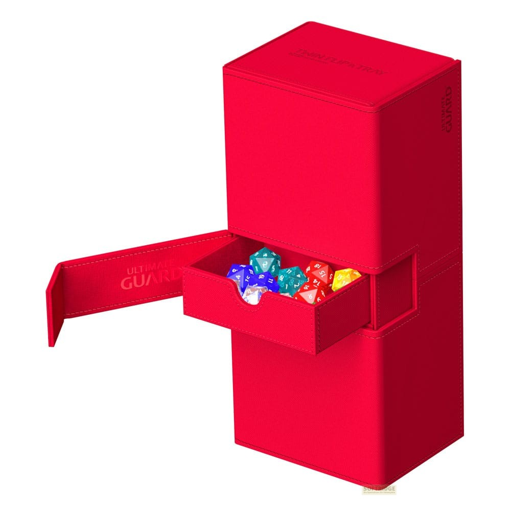 Une boîte de rangement rouge vif avec un tiroir ouvert rempli de dés colorés.