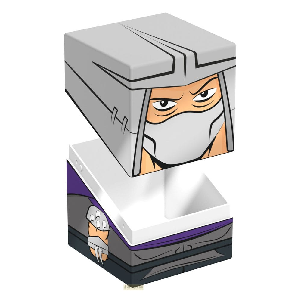 Une boîte en carton carrée illustrant Shredder de TMNT, avec le couvercle ouvert.