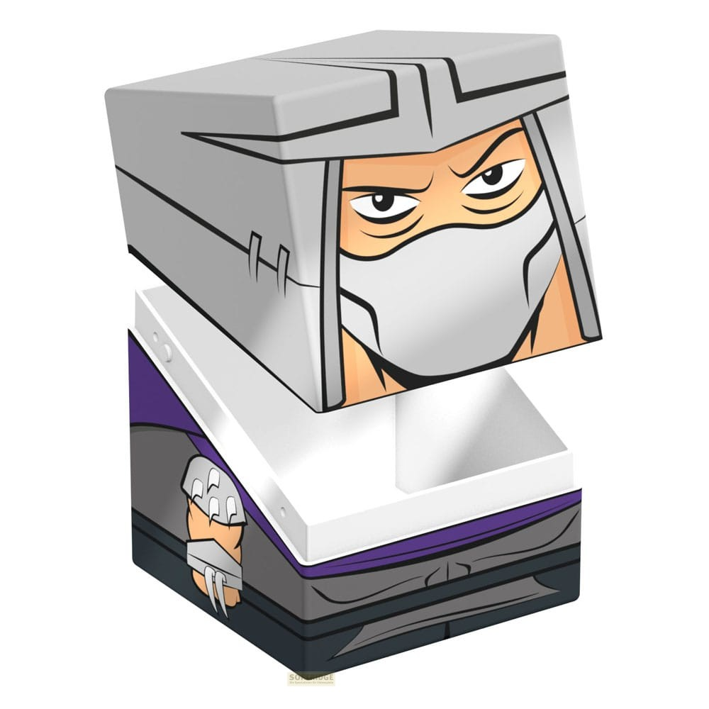 Une boîte de rangement carrée ouverte représentant le personnage Shredder des Tortues Ninja.