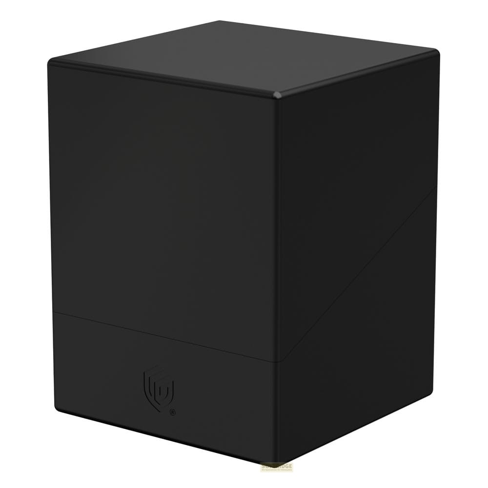 Une boîte de deck noire mate fermée avec un logo en relief sur le devant.
