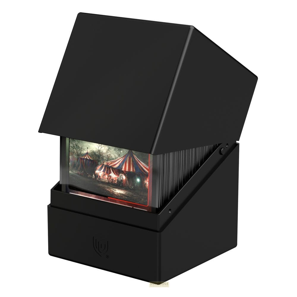 Une boîte de cartes noire avec une illustration de cirque à l'avant.