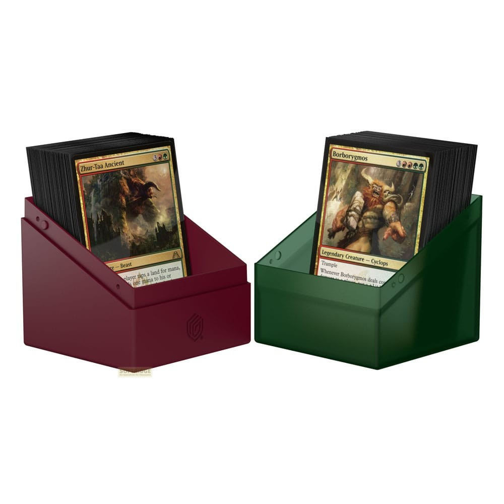 Deux boîtes de jeux de cartes contiennent des cartes avec des créatures fantastiques.