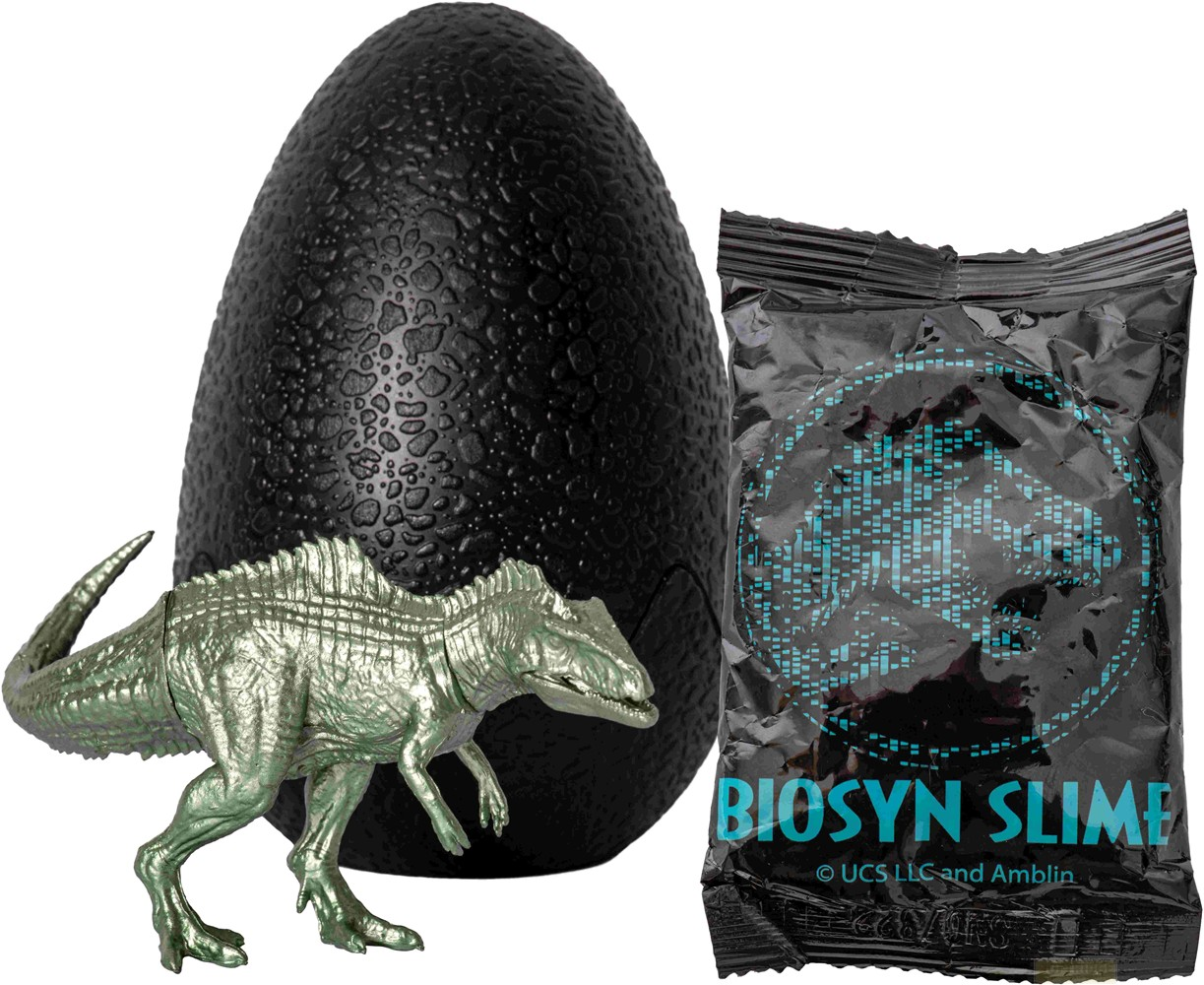 Ein strukturiertes schwarzes Dinosaurierei, eine silberne Dinosaurierfigur und eine schwarze Biosyn-Slime-Packung.