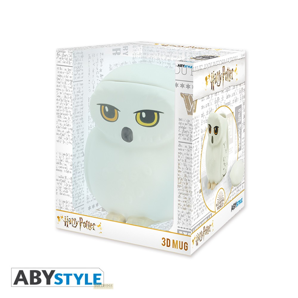 Una tazza 3D bianca a forma di gufo di Harry Potter in una scatola.