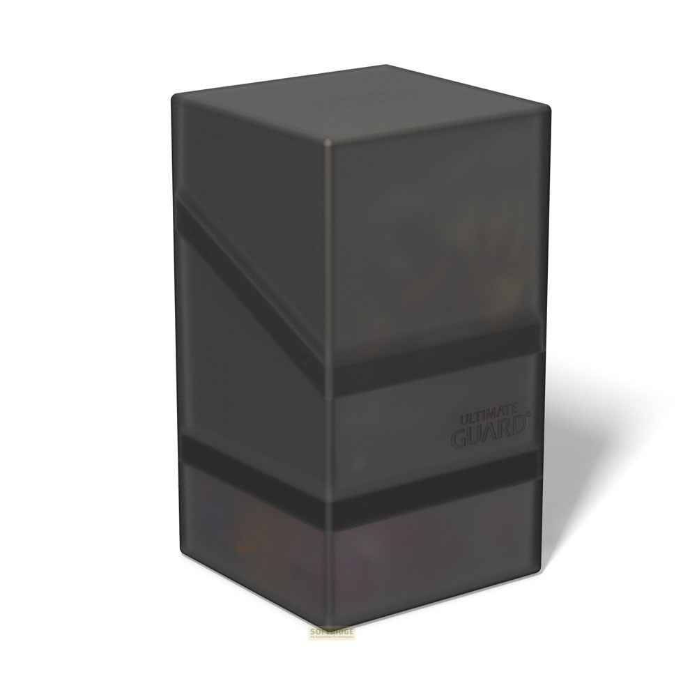 Une boîte de deck Ultimate Guard gris foncé semi-transparente sur une surface blanche.