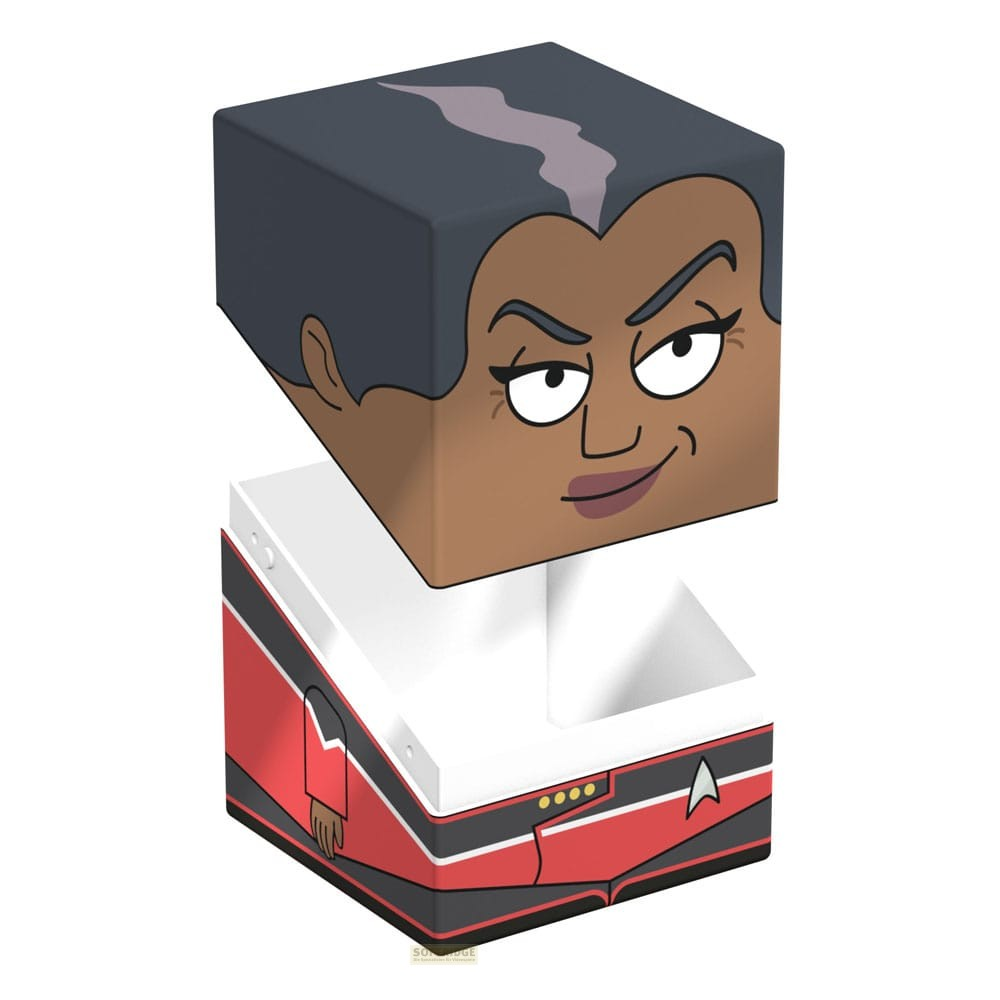 Une figurine de personnage Star Trek cubique en rouge, noir et blanc avec des cheveux sombres.