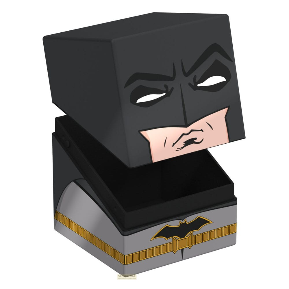 Une boîte cube Batman avec un couvercle tête amovible et une ceinture jaune sur le corps gris.