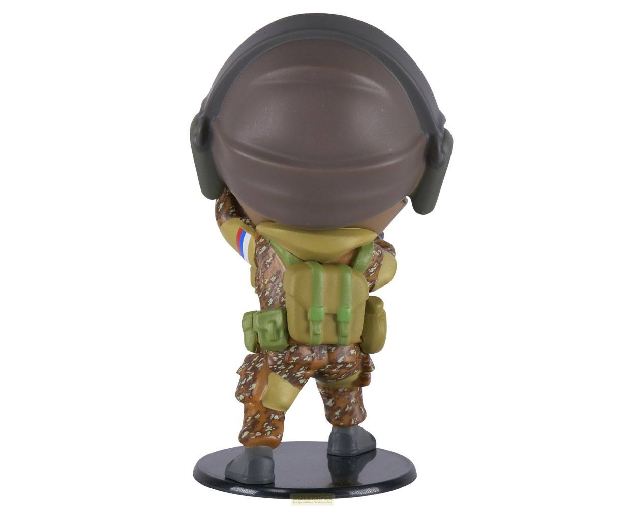 Rückansicht einer Vinyl-Sammelfigur eines Soldaten in Flecktarn mit Ausrüstung.