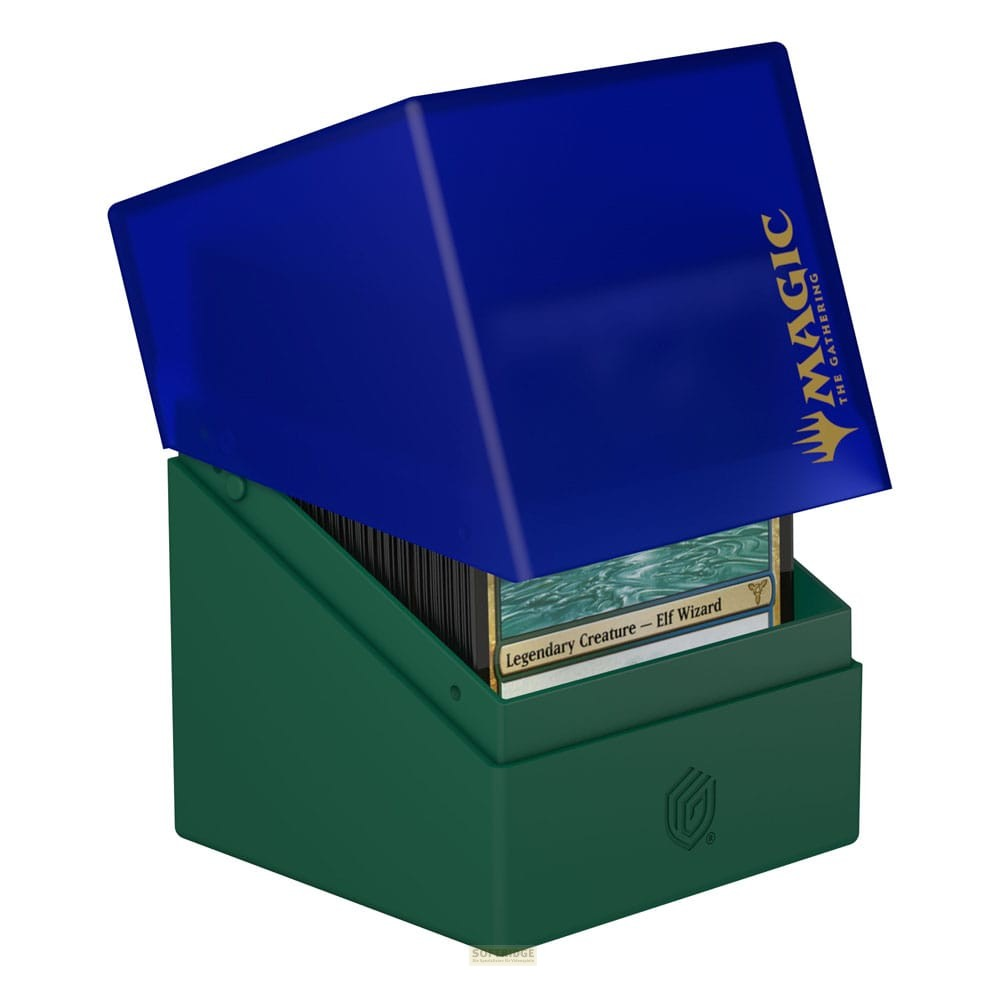 Une boîte de cartes verte avec un couvercle bleu contient des cartes Magic, une montre Créature légendaire - Elfe sorcier.