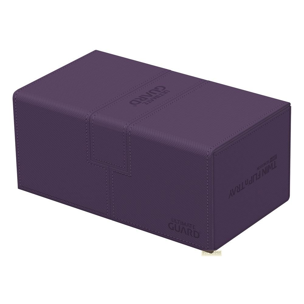Une boîte de deck Ultimate Guard Twin Flip'n'Tray violette fermée sur fond blanc.