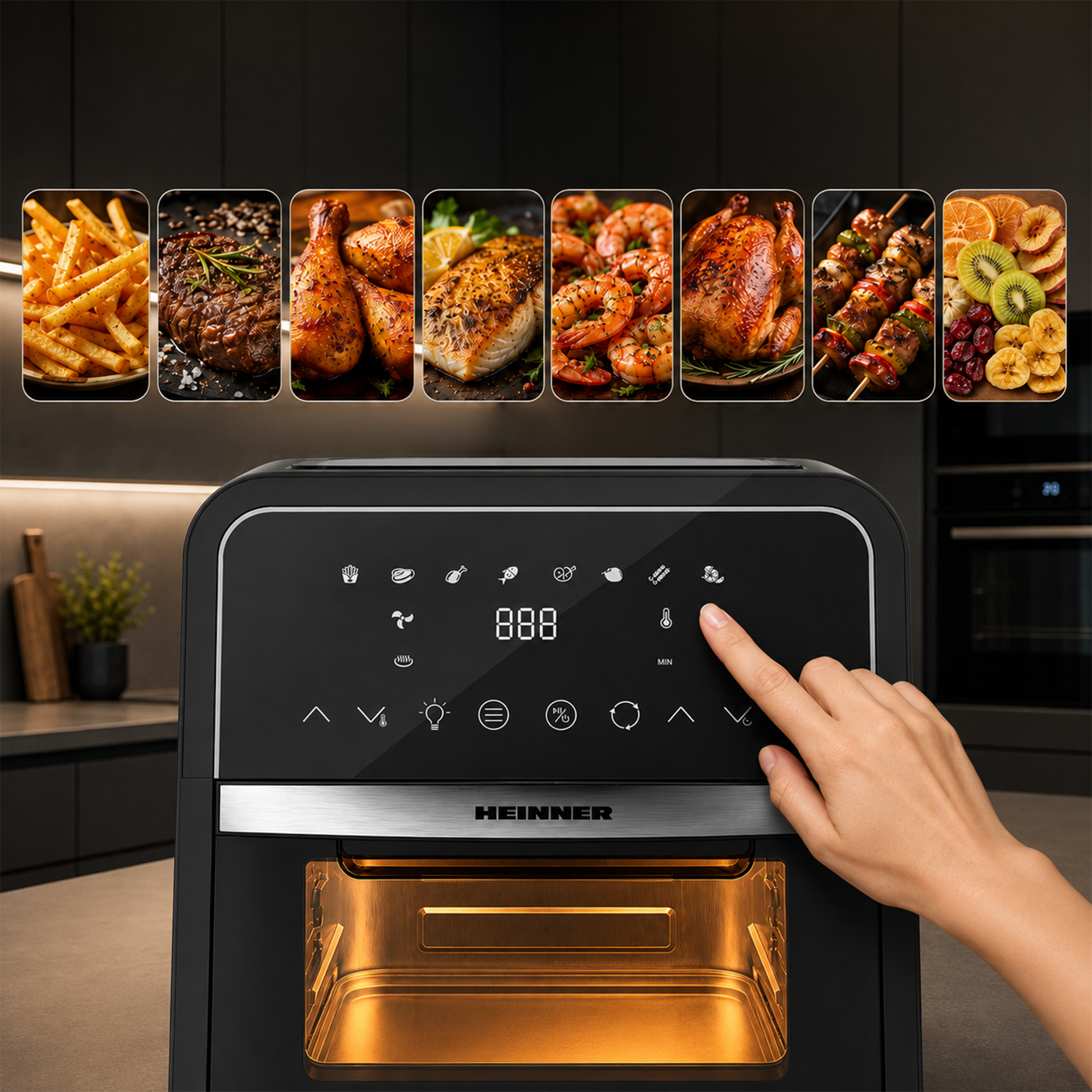 Een hand bedient het digitale bedieningspaneel van een zwarte Heinner-heteluchtfriteuse met voedseliconen.
