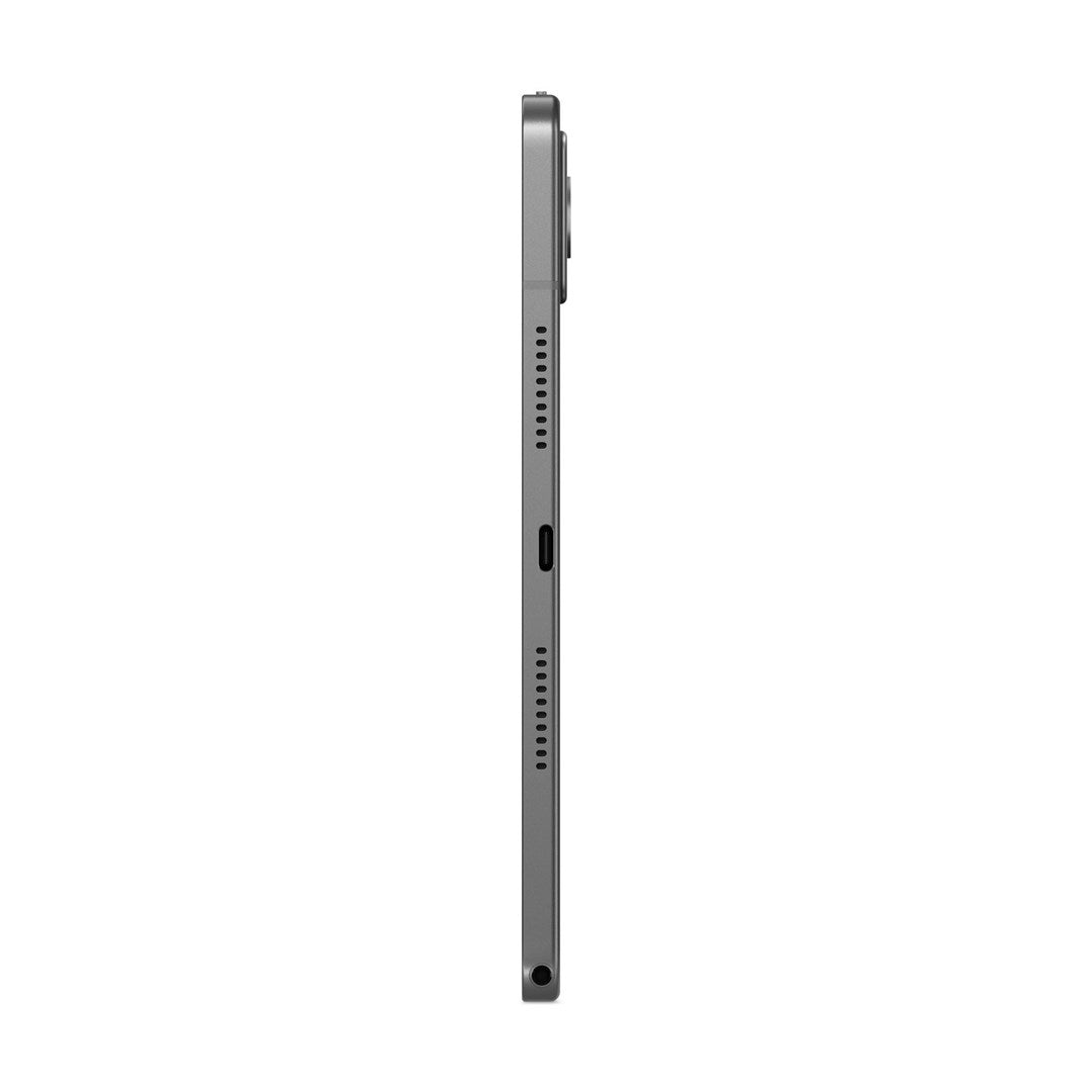Vista laterale di un tablet grigio con griglie degli altoparlanti, porta USB-C e jack per cuffie.