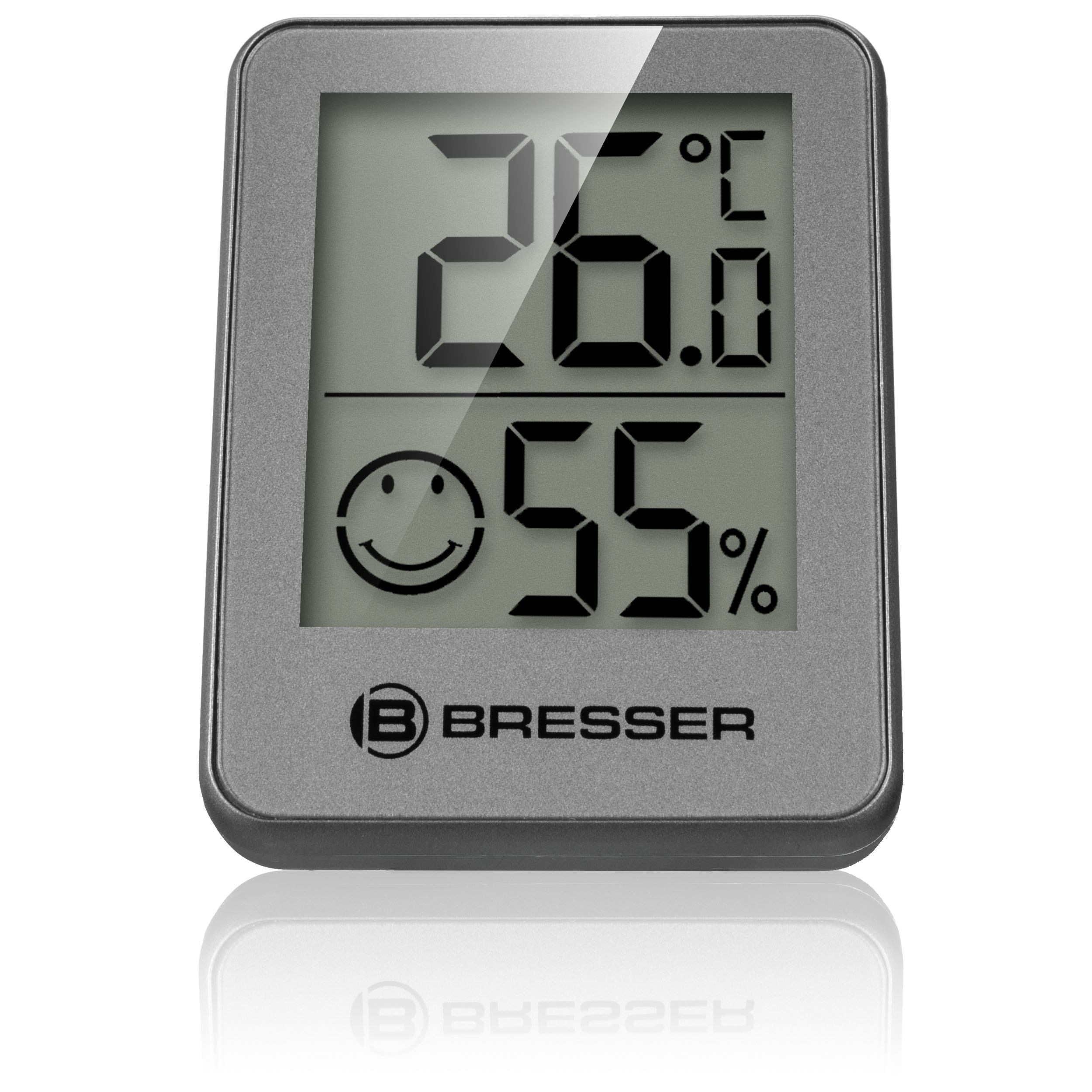 Termómetro y higrómetro Bresser gris con pantalla digital que muestra 26.0 grados y 55 por ciento de humedad.