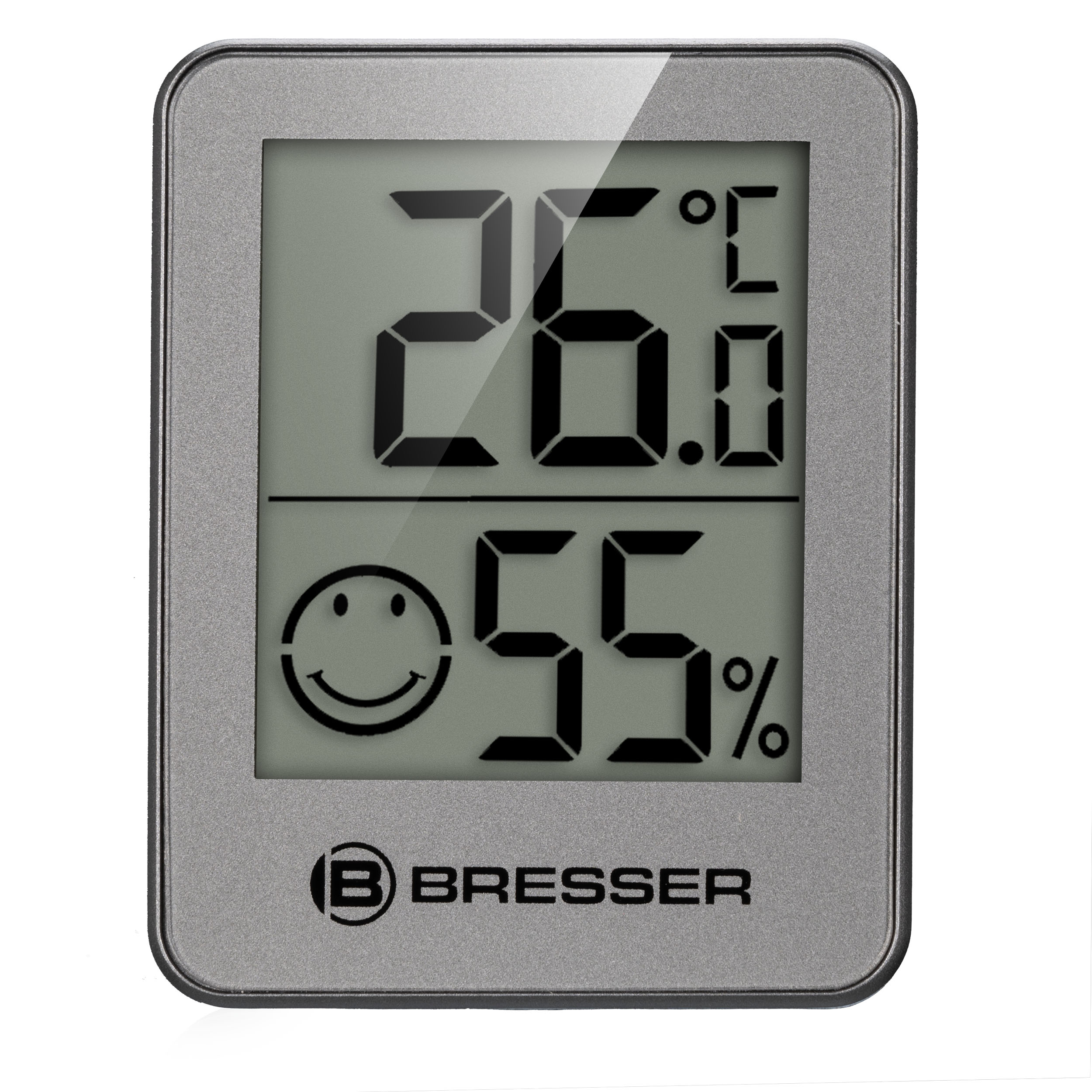 Un higrómetro y termómetro digital Bresser gris que muestra 26,0 grados Celsius y 55 por ciento de humedad con una sonrisa.