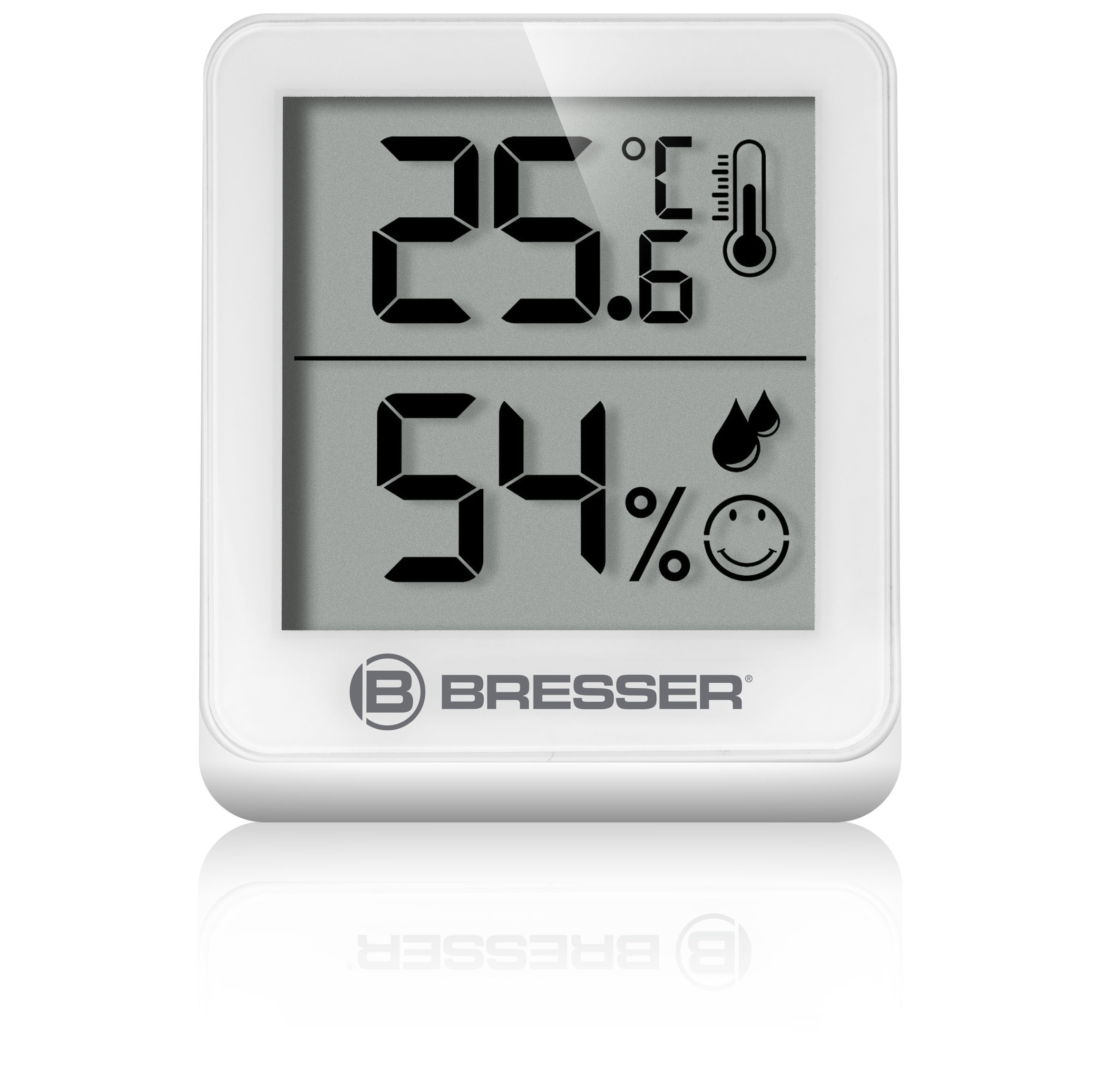 Un termohigrómetro blanco Bresser que muestra 25,6 grados Celsius y 54 por ciento de humedad.